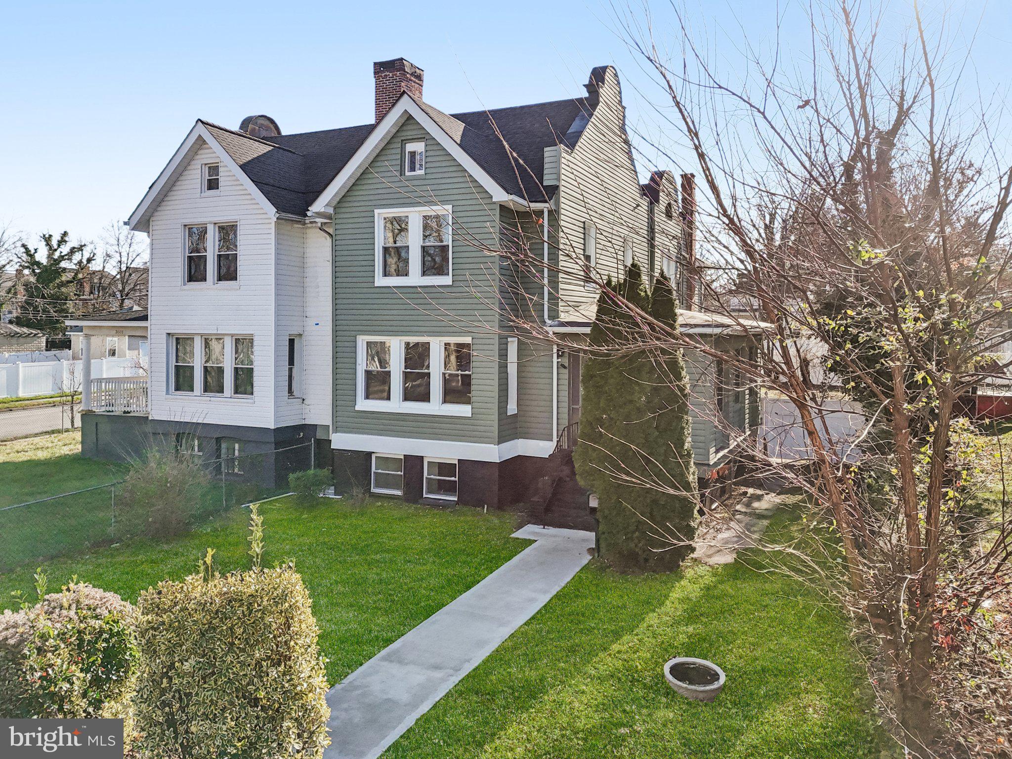 3603 Springdale Avenue Baltimore, MD 21216 - Photo 5 of 63 a view of a house with a yard