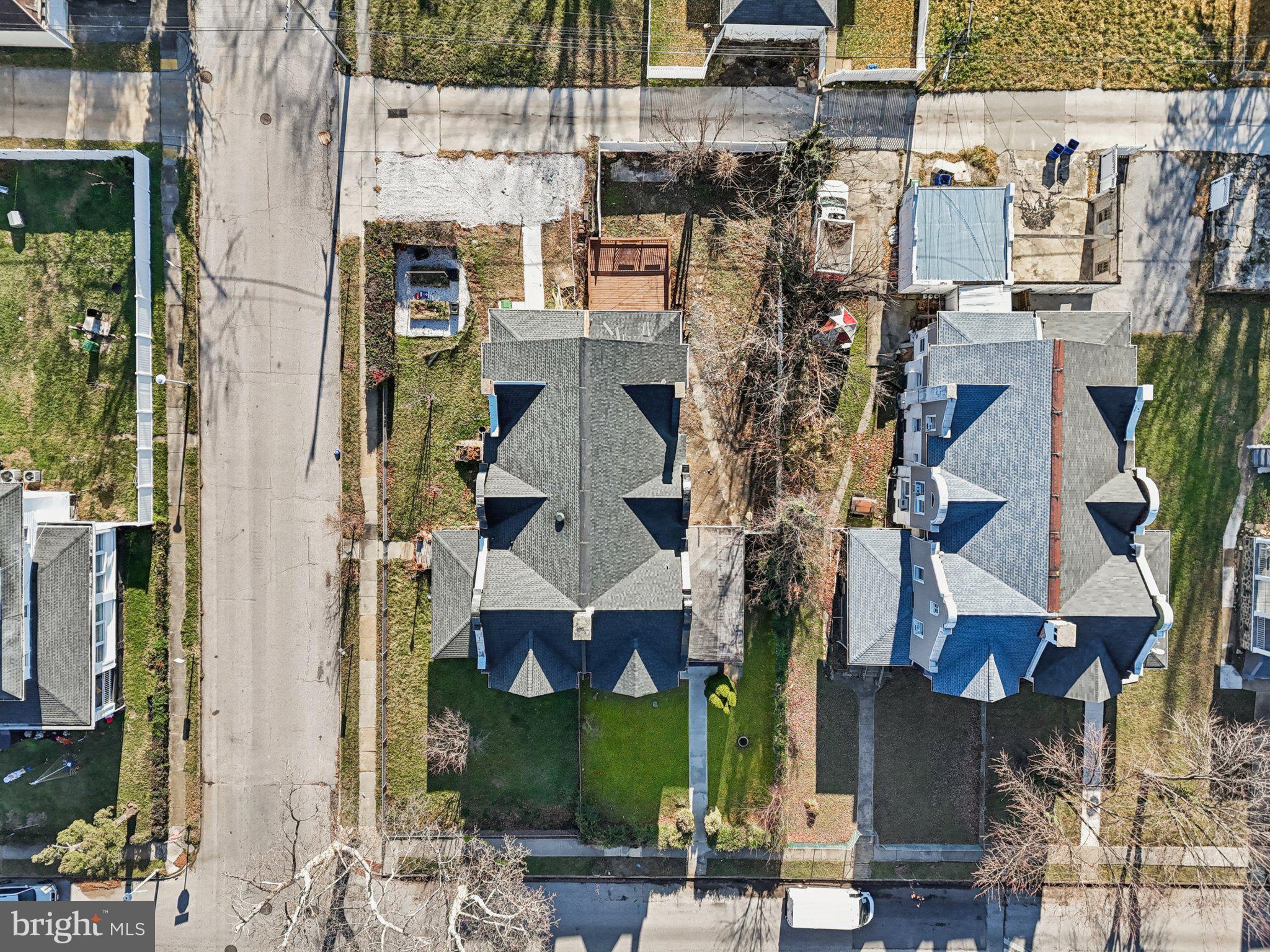 3603 Springdale Avenue Baltimore, MD 21216 - Photo 51 of 63 an aerial view of multi story residential apartment building with yard