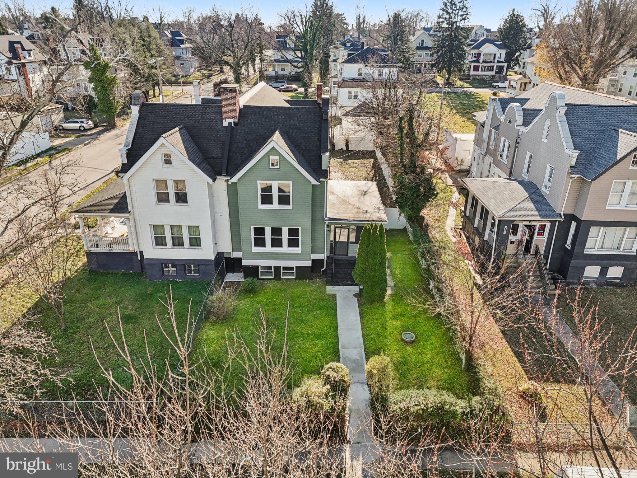 3603 Springdale Avenue Baltimore, MD 21216 - Photo 53 of 63 a front view of a house with garden