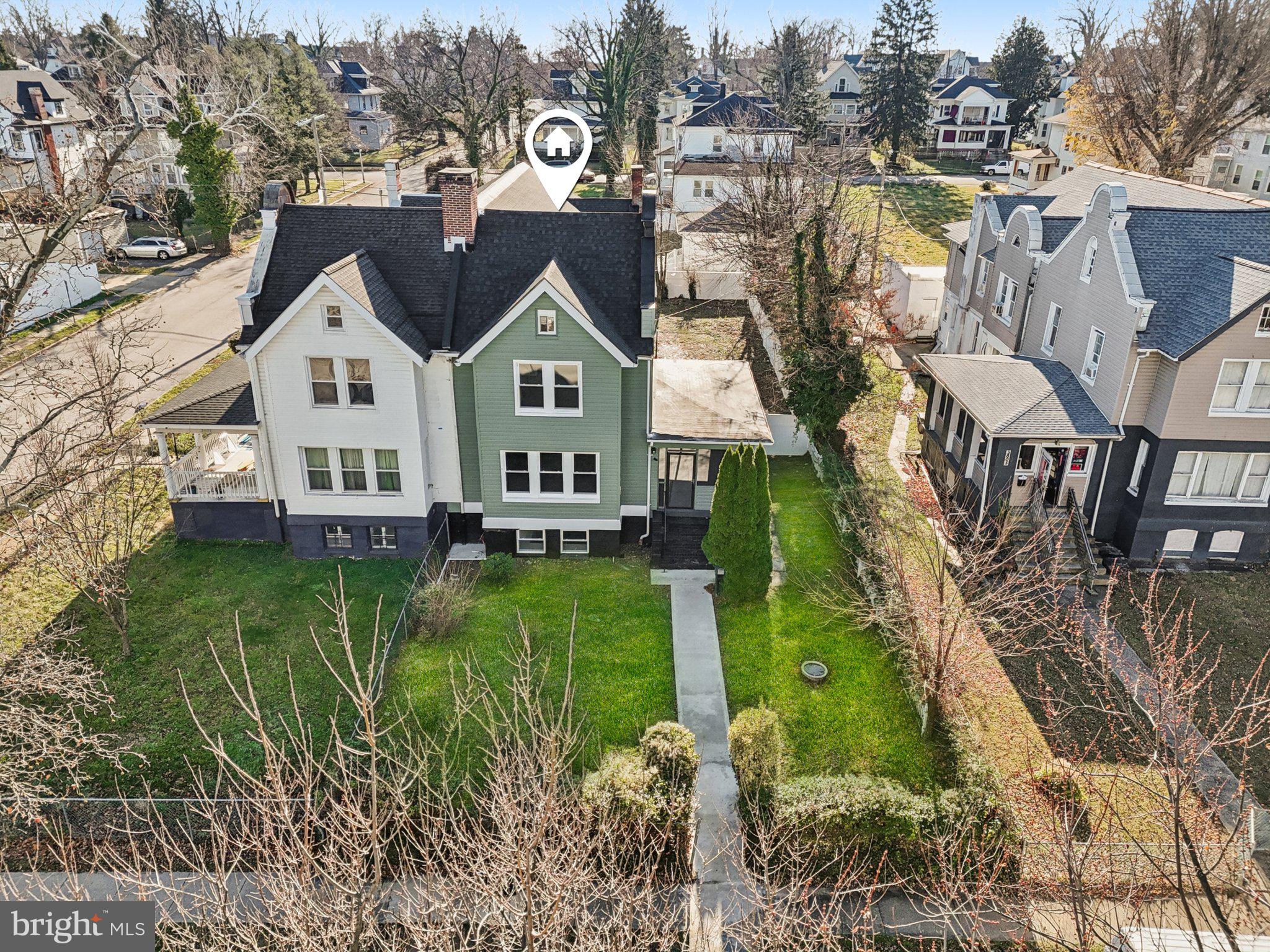 3603 Springdale Avenue Baltimore, MD 21216 - Photo 54 of 63 a front view of a house with garden