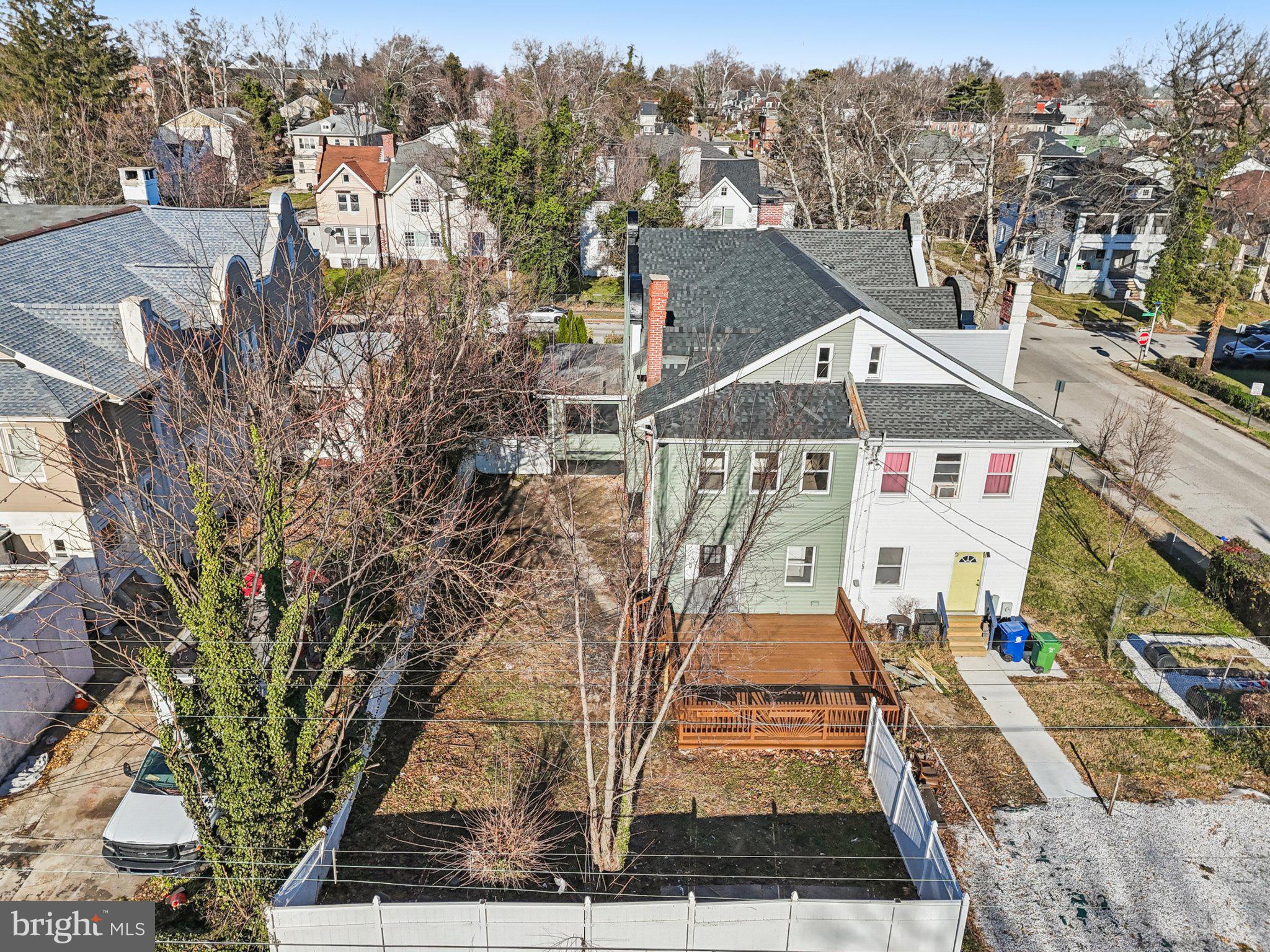 3603 Springdale Avenue Baltimore, MD 21216 - Photo 57 of 63 a front view of a house with a yard
