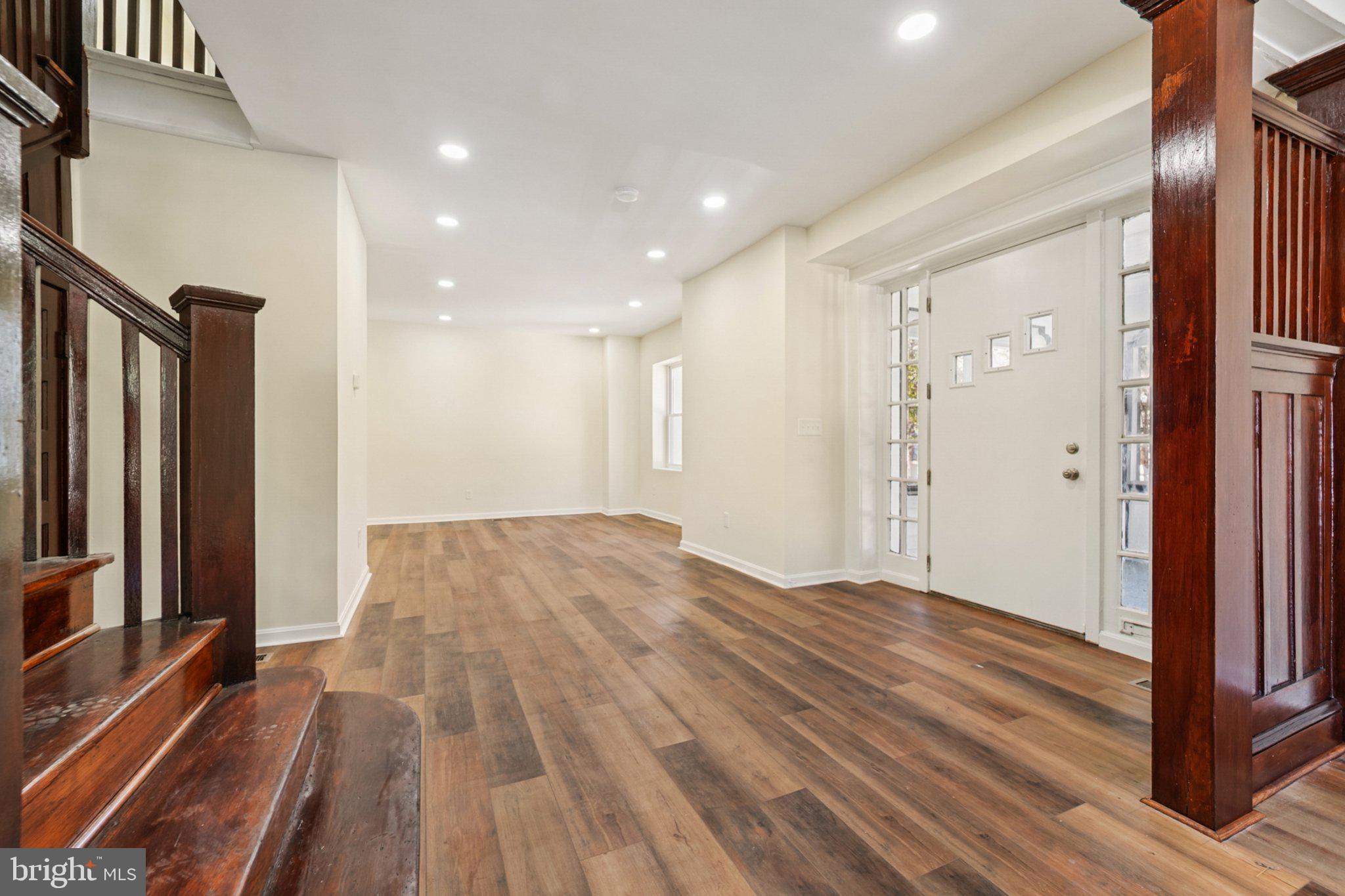 3603 Springdale Avenue Baltimore, MD 21216 - Photo 10 of 63 a view of empty room with wooden floor and fan