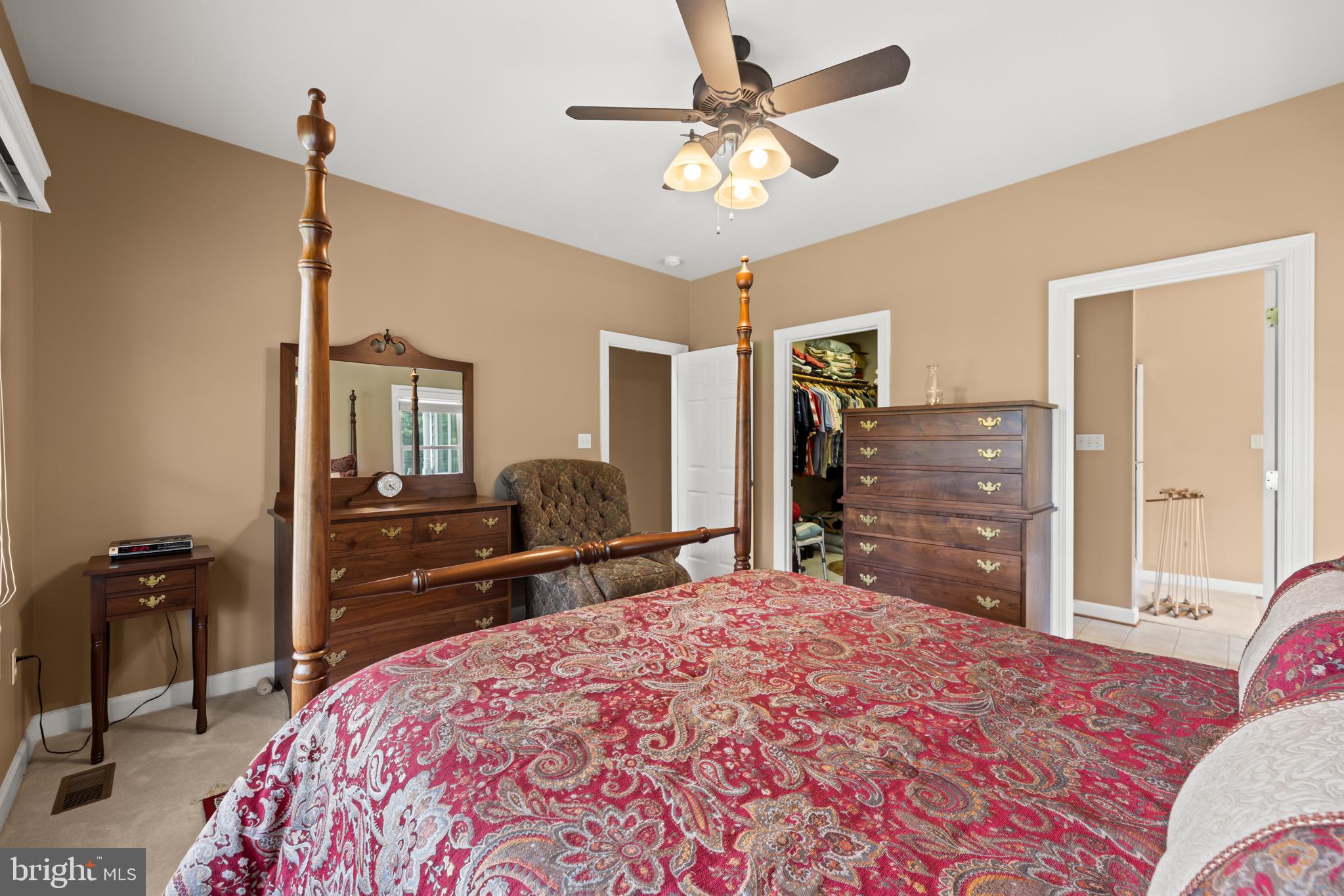 1688 Desert Road Reva, VA 22735 - Photo 32 of 81 a bedroom with a bed dresser and a chair