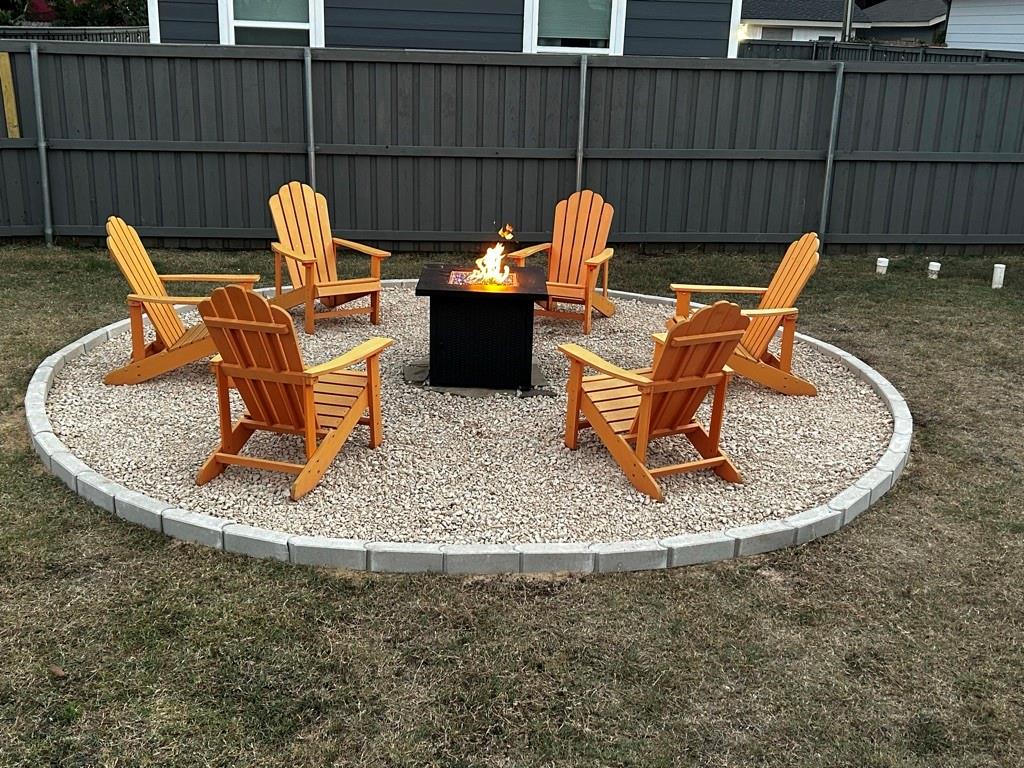 1606 West 12th Street Dallas, TX 75208 - Photo 12 of 20 View of patio / terrace with an outdoor fire pit