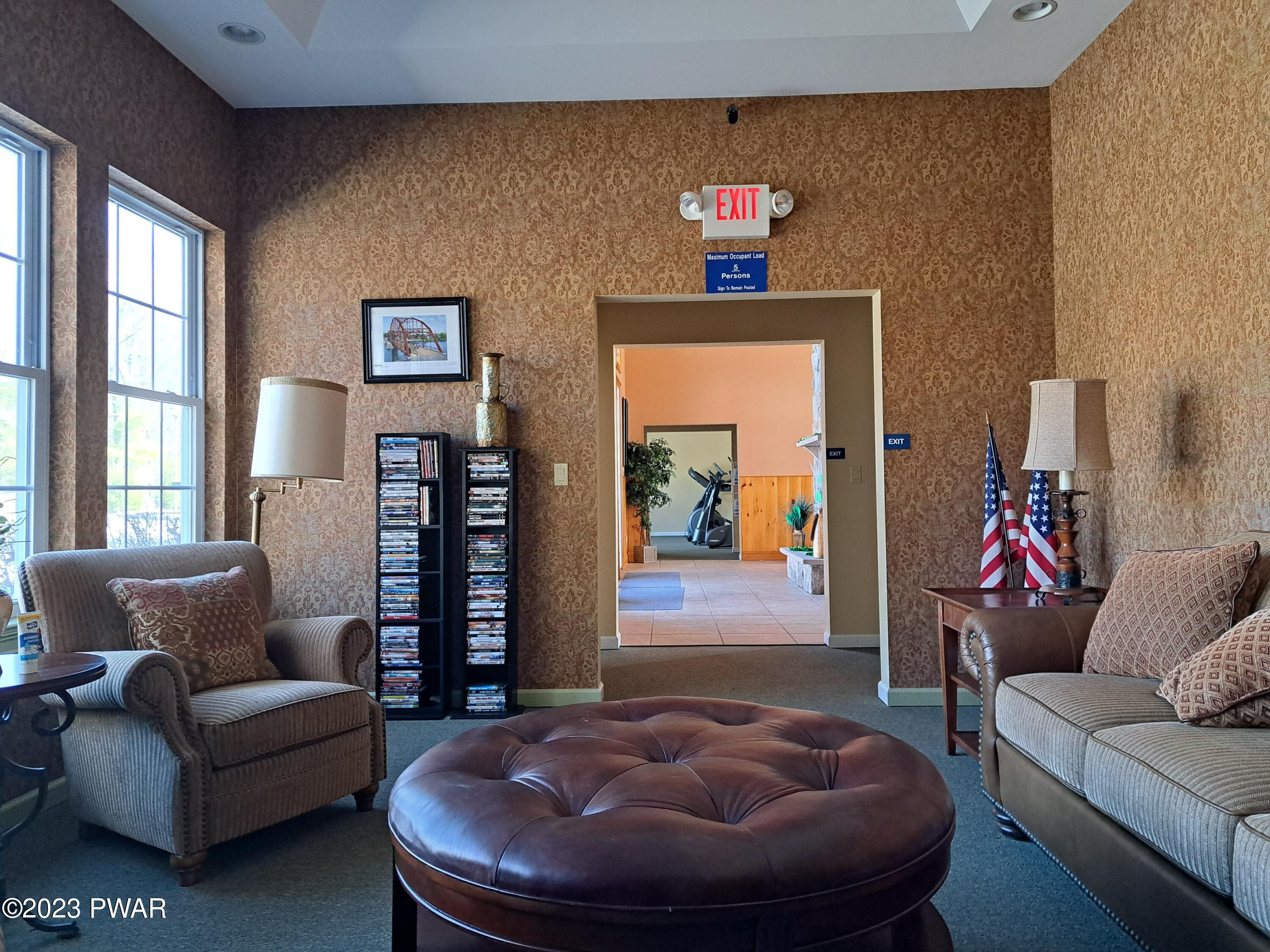 806 MacIntosh Way Matamoras, PA 18336 - Photo 50 of 53 a living room with furniture and a window
