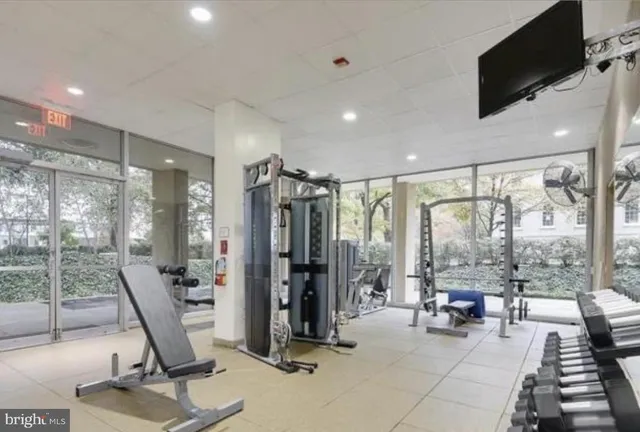 a lobby with entryway and furniture