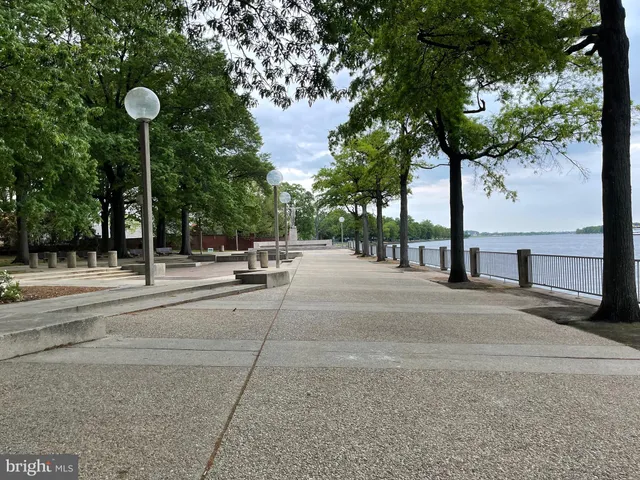 a view of a big building next to a road