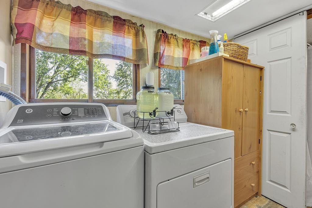 6437 Tuscarawas Road Midland, PA 15059 - Photo 16 of 35 a utility room with dryer and washer