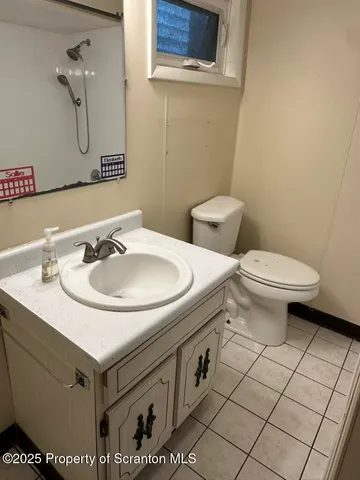 a bathroom with a sink and a toilet