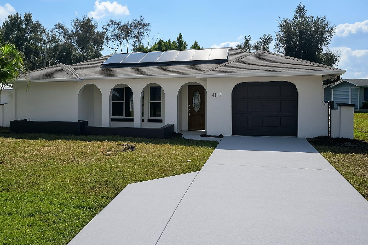 4119 Tangier Street Sebring, FL 33872 - Photo 2 of 2 a front view of a house with garden