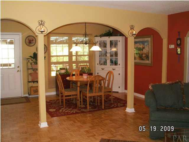 7224 Helms Road Pensacola, FL 32526 - Photo 3 of 23 View from the front door into the family room and dining area.