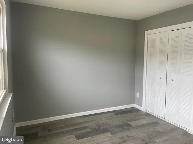 an empty room with window