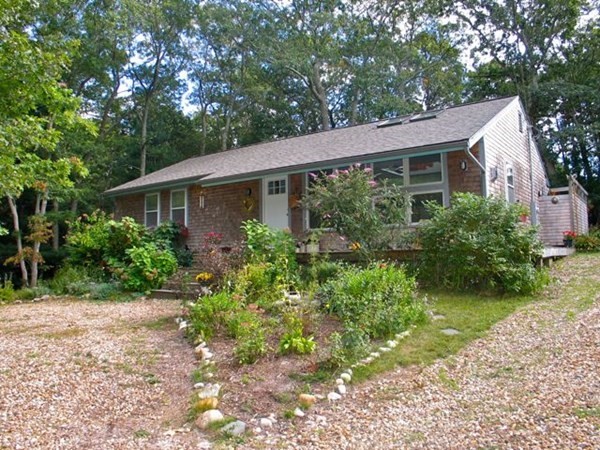 100 Franklin Avenue Tisbury, MA 02568 - Photo 18 of 18 a front view of a house with garden