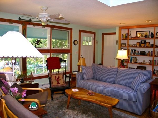 100 Franklin Avenue Tisbury, MA 02568 - Photo 4 of 18 a living room with furniture a rug and a window