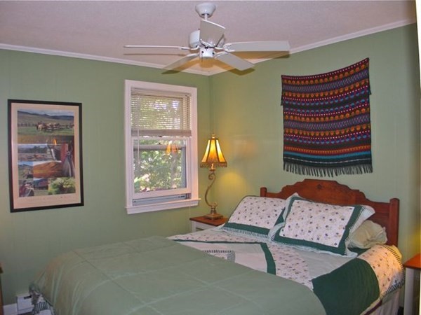 100 Franklin Avenue Tisbury, MA 02568 - Photo 10 of 18 a bedroom with a bed and a window