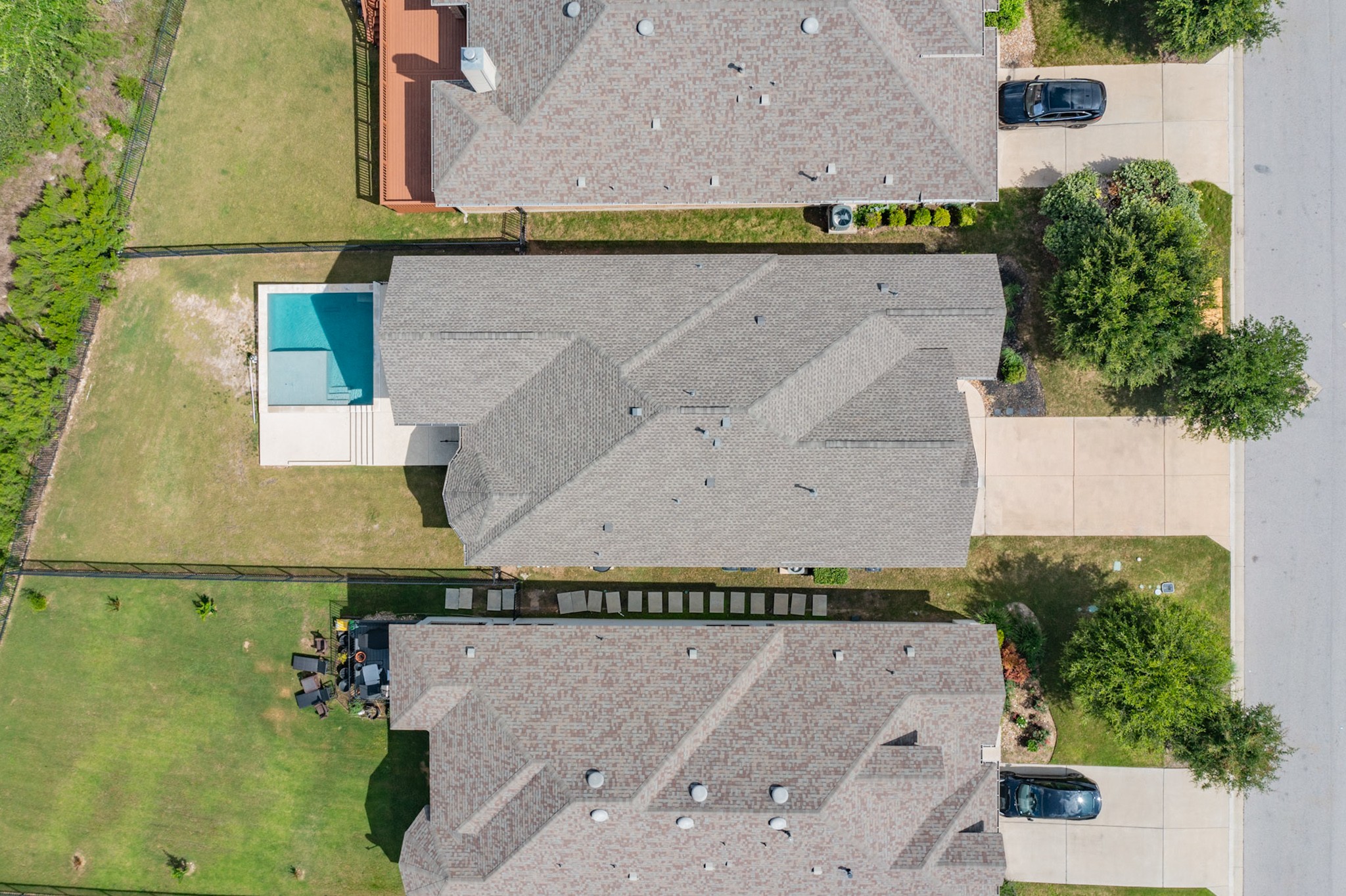 2617 Milan Meadows Drive Leander, TX 78641 - Photo 36 of 40 An aerial perspective reveals a sparkling pool nestled in the private yard of this residence.