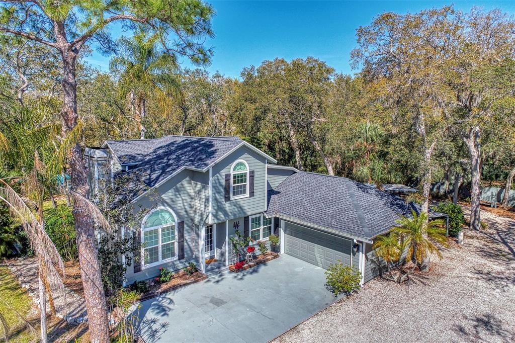 4644 South Lockwood Ridge Road Sarasota, FL 34231 - Photo 1 of 1 Main house with beautiful brand-new roof