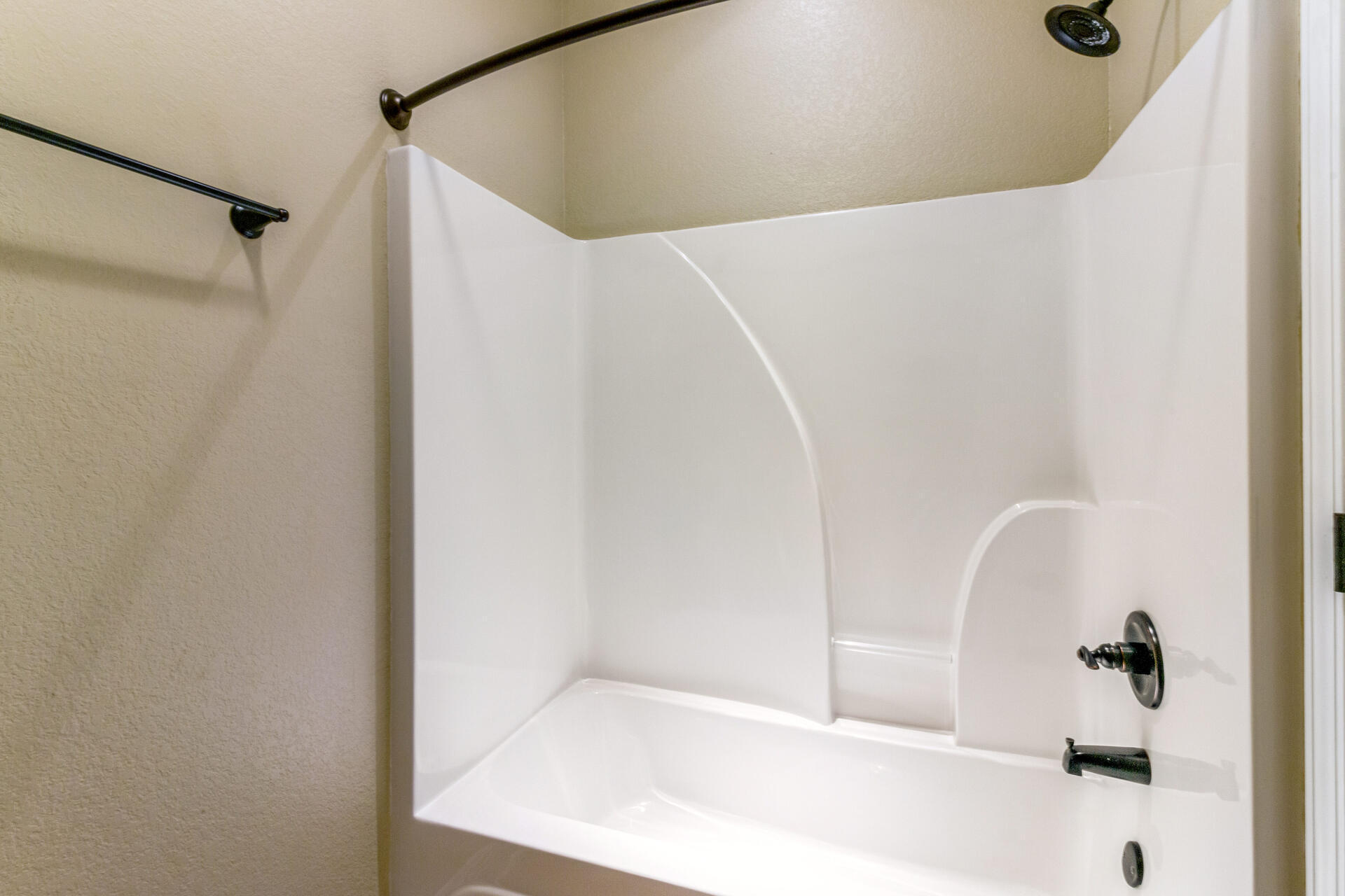 4091 Happy Trails Road Crestview, FL 32539 - Photo 24 of 41 a bathroom with a white bath tub
