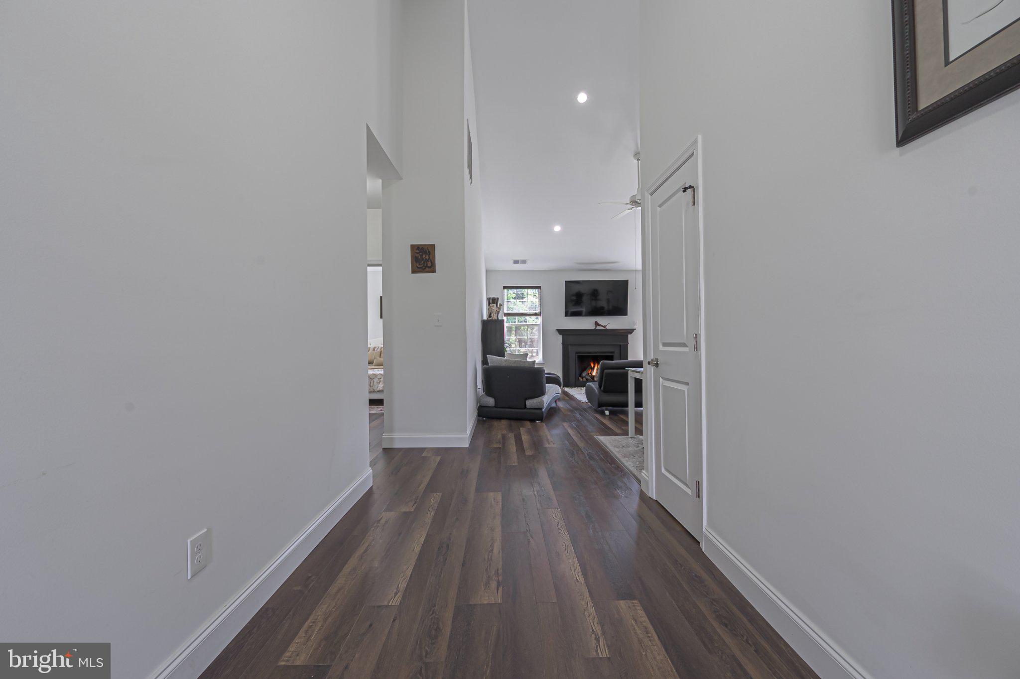 1092 Chews Landing Road Clementon, NJ 08021 - Photo 11 of 41 Inviting hallway with warm wood floors.