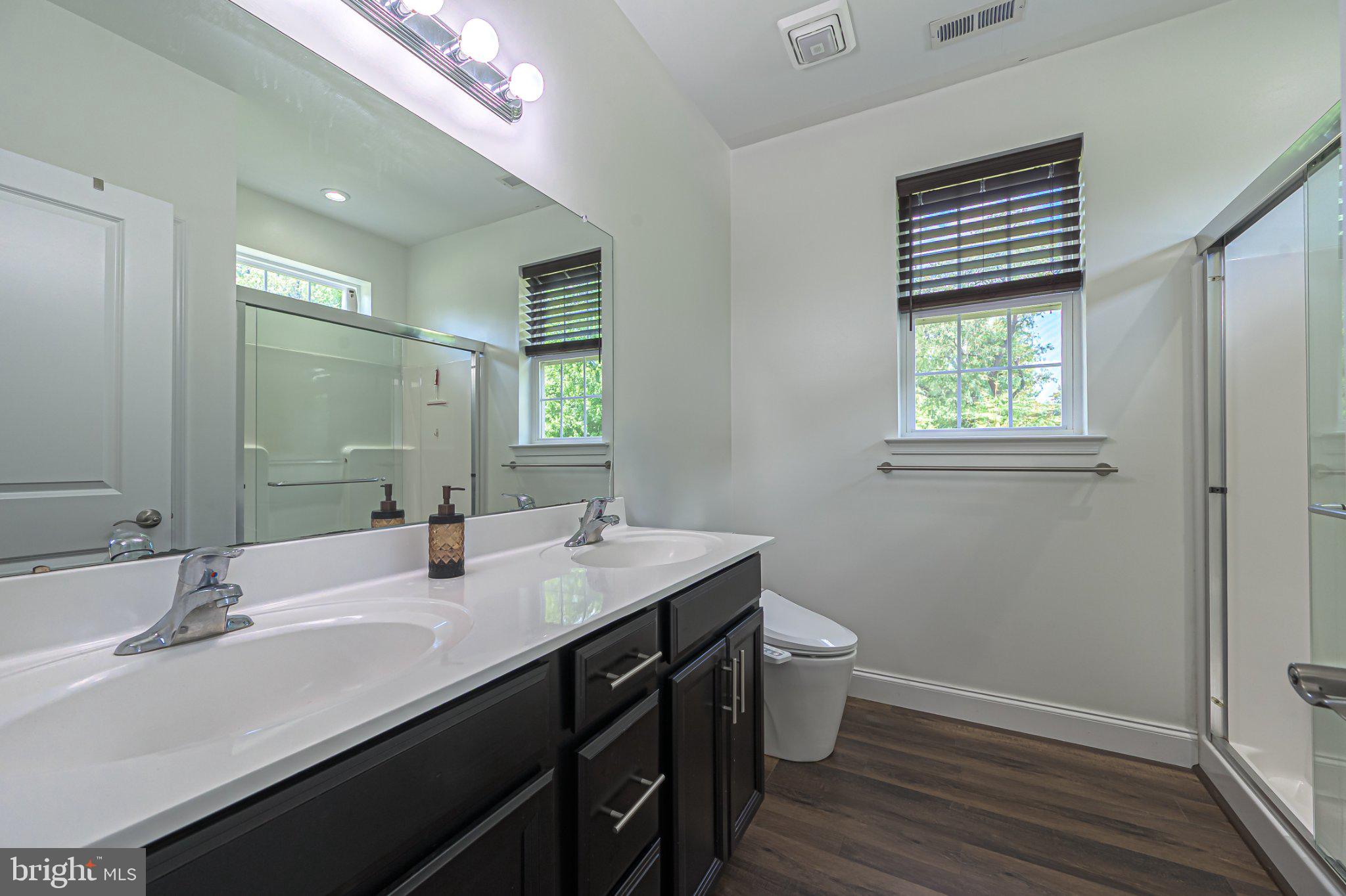 1092 Chews Landing Road Clementon, NJ 08021 - Photo 25 of 41 Modern bathroom with natural light.