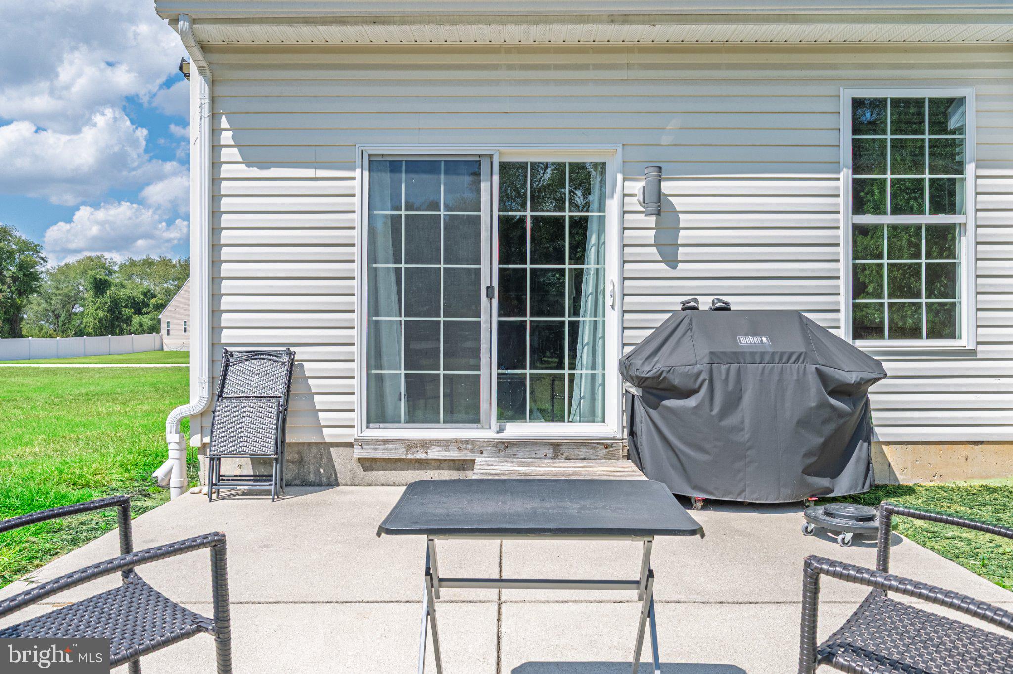 1092 Chews Landing Road Clementon, NJ 08021 - Photo 37 of 41 Sunny patio with grill and greenery.
