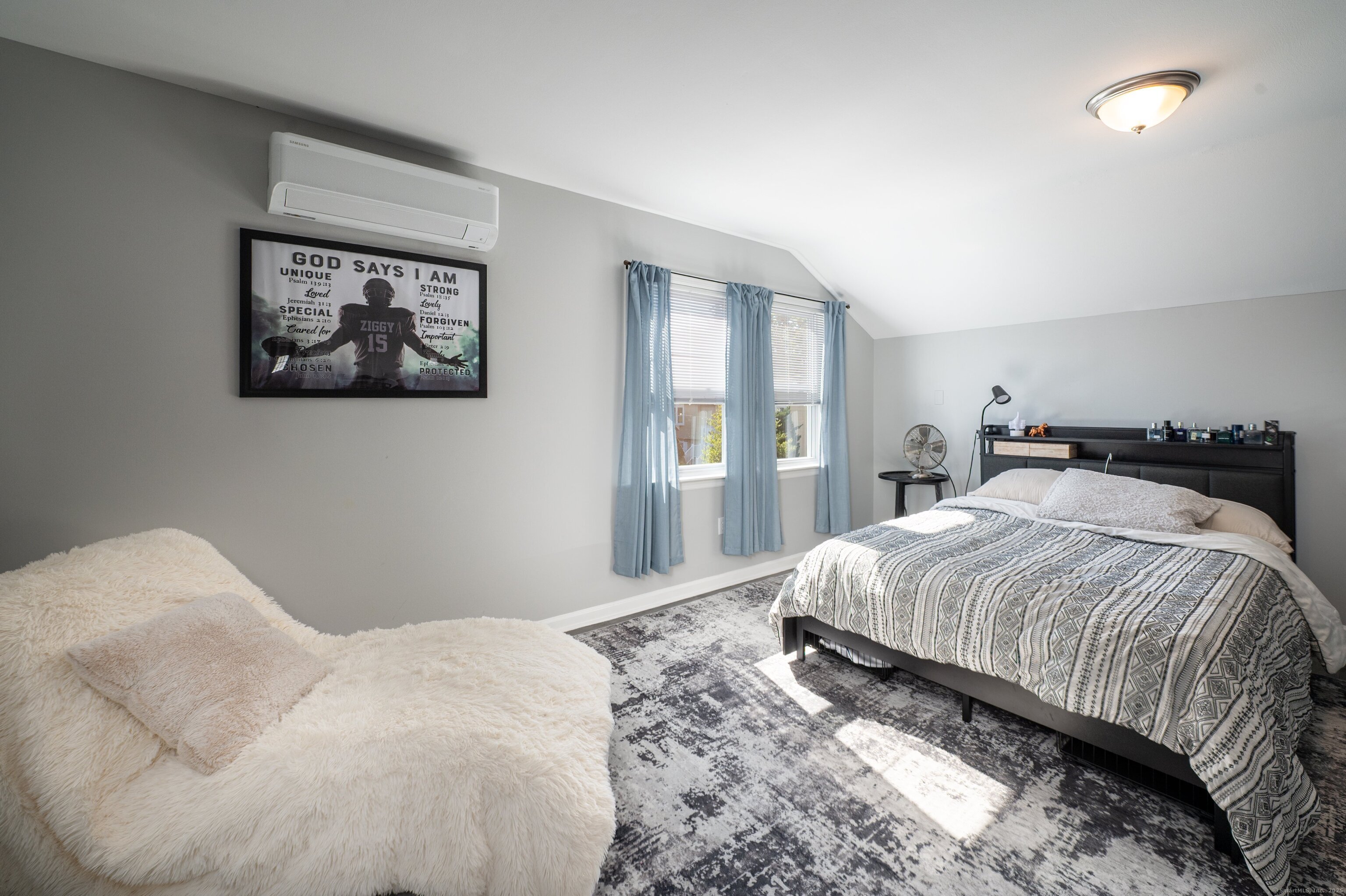 Beach Road Old Saybrook, CT 06475 - Photo 3 of 16 a bedroom with a large bed and a window