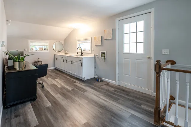 a view of a kitchen from the hallway