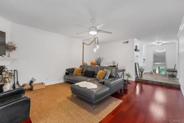 a kitchen with stainless steel appliances granite countertop wooden cabinets a sink and a stove
