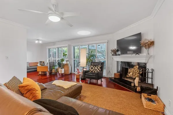 a kitchen with stainless steel appliances granite countertop wooden cabinets a sink and a stove