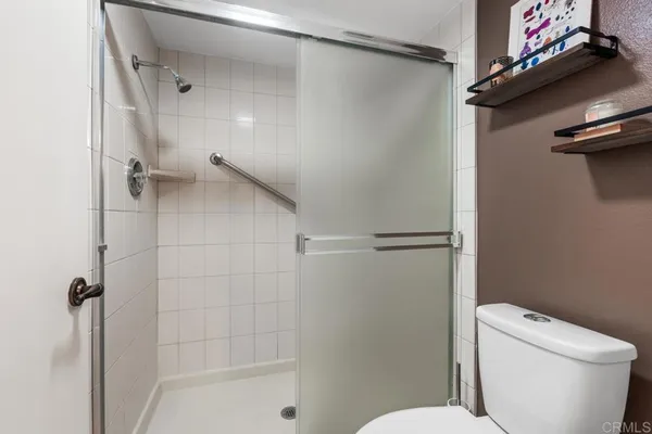 a view of a city with a lake