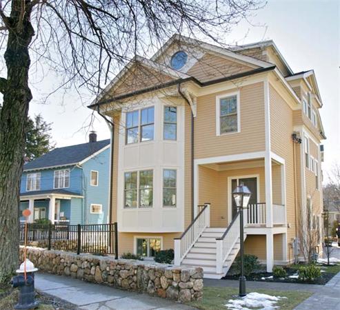 23 Loveland Road, Unit 1 Brookline, MA 02445 - Photo 1 of 1 a front view of a house with a yard