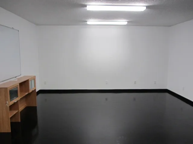 a view of workspace with wooden wall