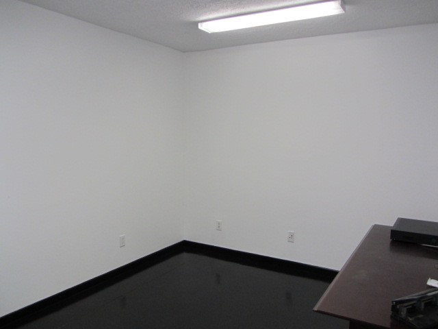 228 Farm To Market Road 3478 Huntsville, TX 77320 - Photo 12 of 28 a view of an empty room