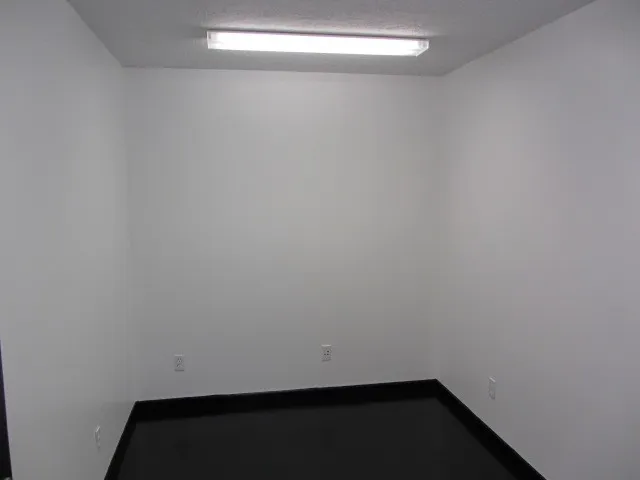 a room with furniture and wooden floor