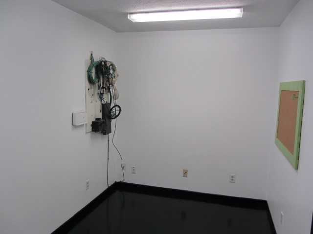 228 Farm To Market Road 3478 Huntsville, TX 77320 - Photo 15 of 28 a view of small space with racks on the wall