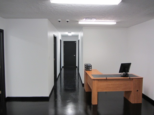 228 Farm To Market Road 3478 Huntsville, TX 77320 - Photo 16 of 28 a room with furniture and wooden floor