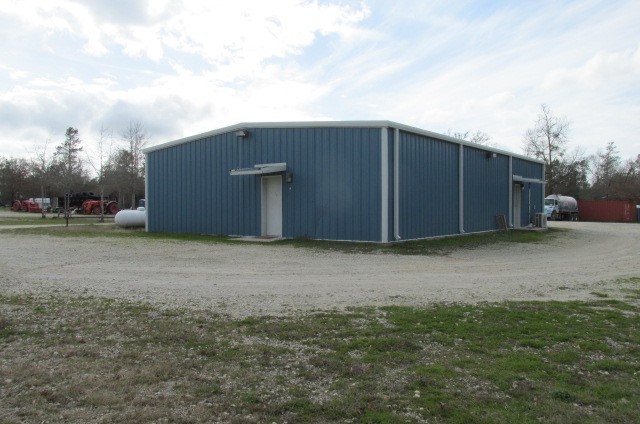 228 Farm To Market Road 3478 Huntsville, TX 77320 - Photo 2 of 28 a house with a outdoor space