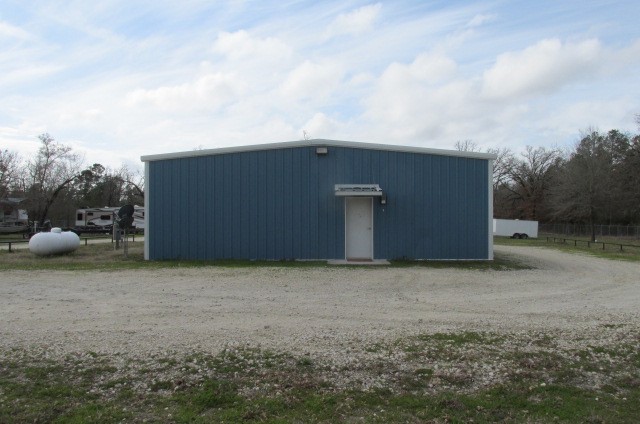 228 Farm To Market Road 3478 Huntsville, TX 77320 - Photo 3 of 28 a backyard of a house
