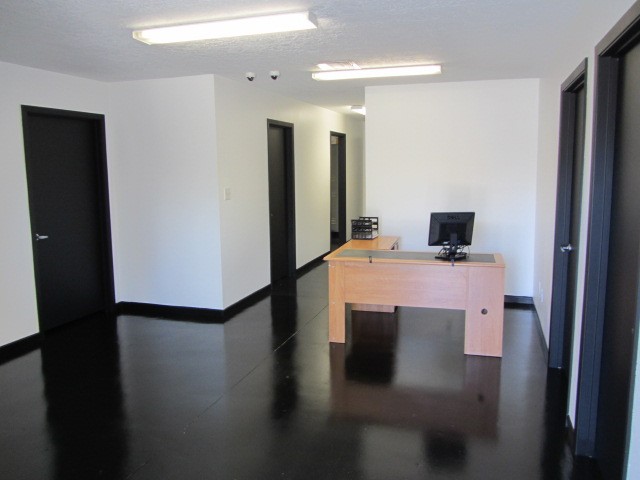 228 Farm To Market Road 3478 Huntsville, TX 77320 - Photo 7 of 28 a view of kitchen with a refrigerator