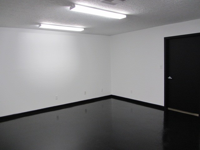 228 Farm To Market Road 3478 Huntsville, TX 77320 - Photo 10 of 28 a view of an empty room