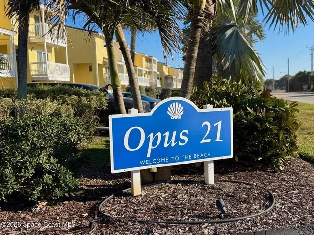 a sign broad in front of a building