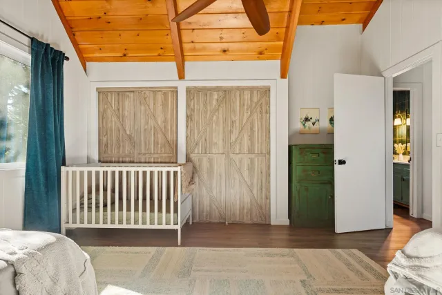 a view of a porch with a door and chair