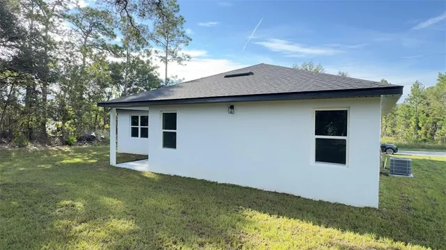 a house with garden in front of it