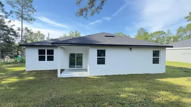 a front view of house with yard