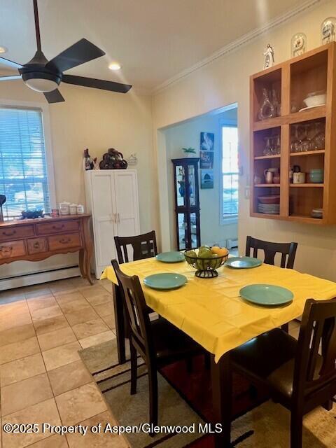 337 West Avenue Rifle, CO 81650 - Photo 17 of 29 a dining room with a table and chairs