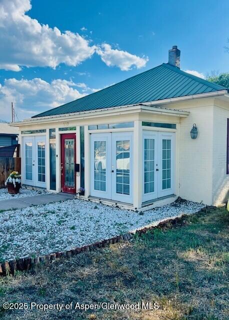 337 West Avenue Rifle, CO 81650 - Photo 2 of 29 a view of a house with backyard porch and garden
