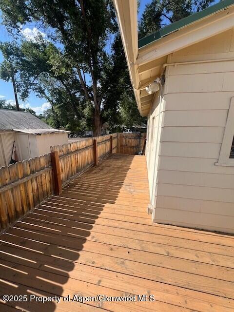 337 West Avenue Rifle, CO 81650 - Photo 28 of 29 a view of balcony with wooden floor and fence