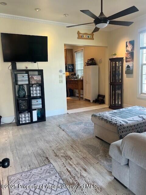 337 West Avenue Rifle, CO 81650 - Photo 8 of 29 a living room with furniture and a flat screen tv