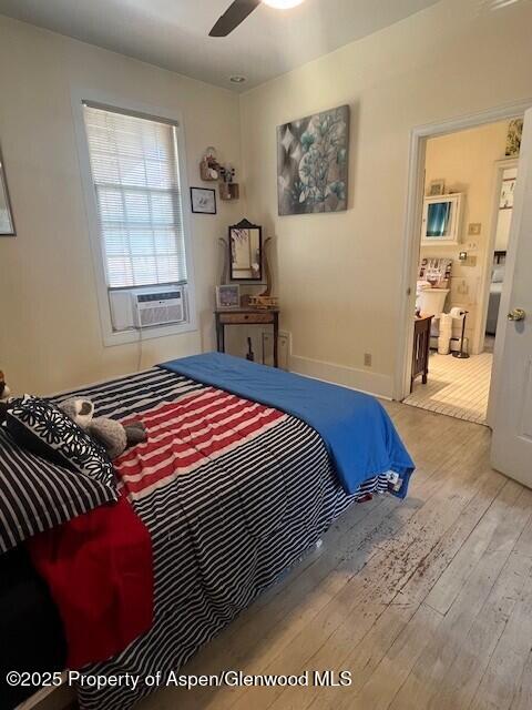 337 West Avenue Rifle, CO 81650 - Photo 9 of 29 a bedroom with a bed and a window