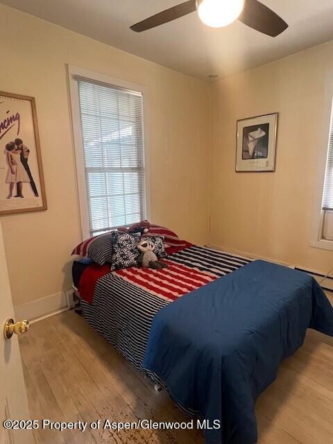 337 West Avenue Rifle, CO 81650 - Photo 10 of 29 a bedroom with a bed and a window